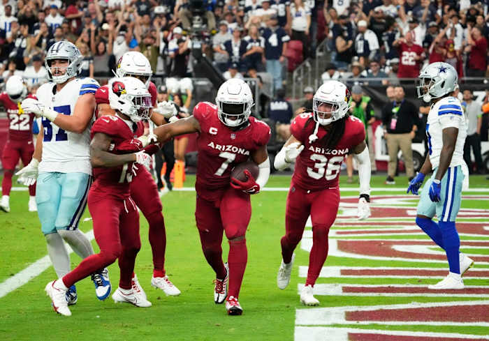 Sep 24, 2023; Glendale, Arizona, USA; Arizona Cardinals linebacker Kyzir White (7) intercepts a Dallas Cowboys pass in the end zone in the second half at State Farm Stadium.